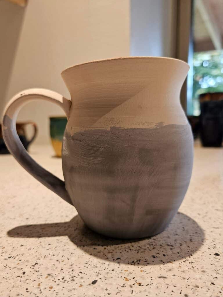Northern Lights glaze combo on the Mug made by Bibi Lene Bruun Andersen before COne 6 firing